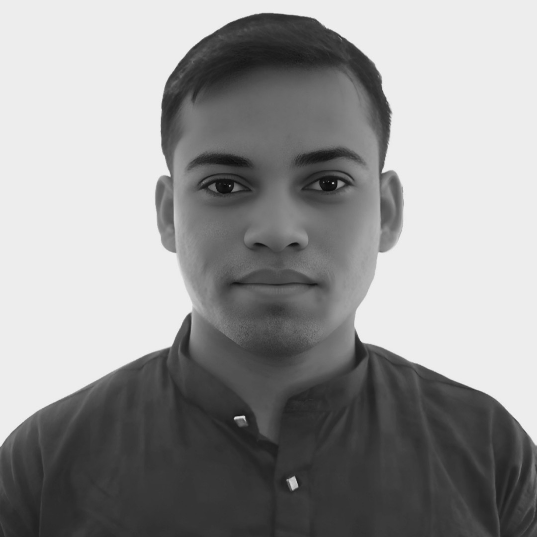 Manindra Roy working at a desk